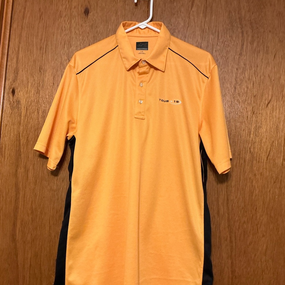 Greg Norman Collection Orange Polo with Black Side Panels